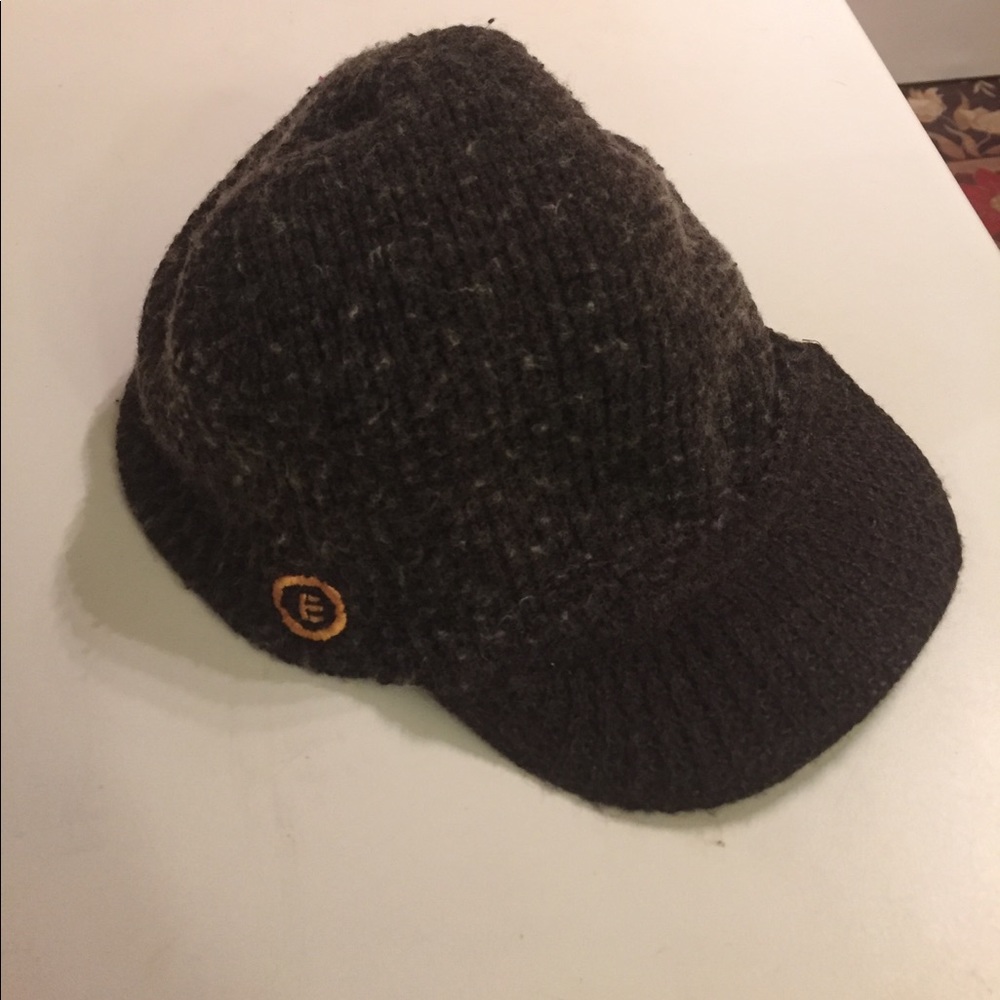 Flat brimmed hat- not sure of brand