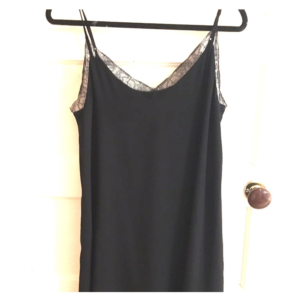 Black slip dress with pretty lace neckline.