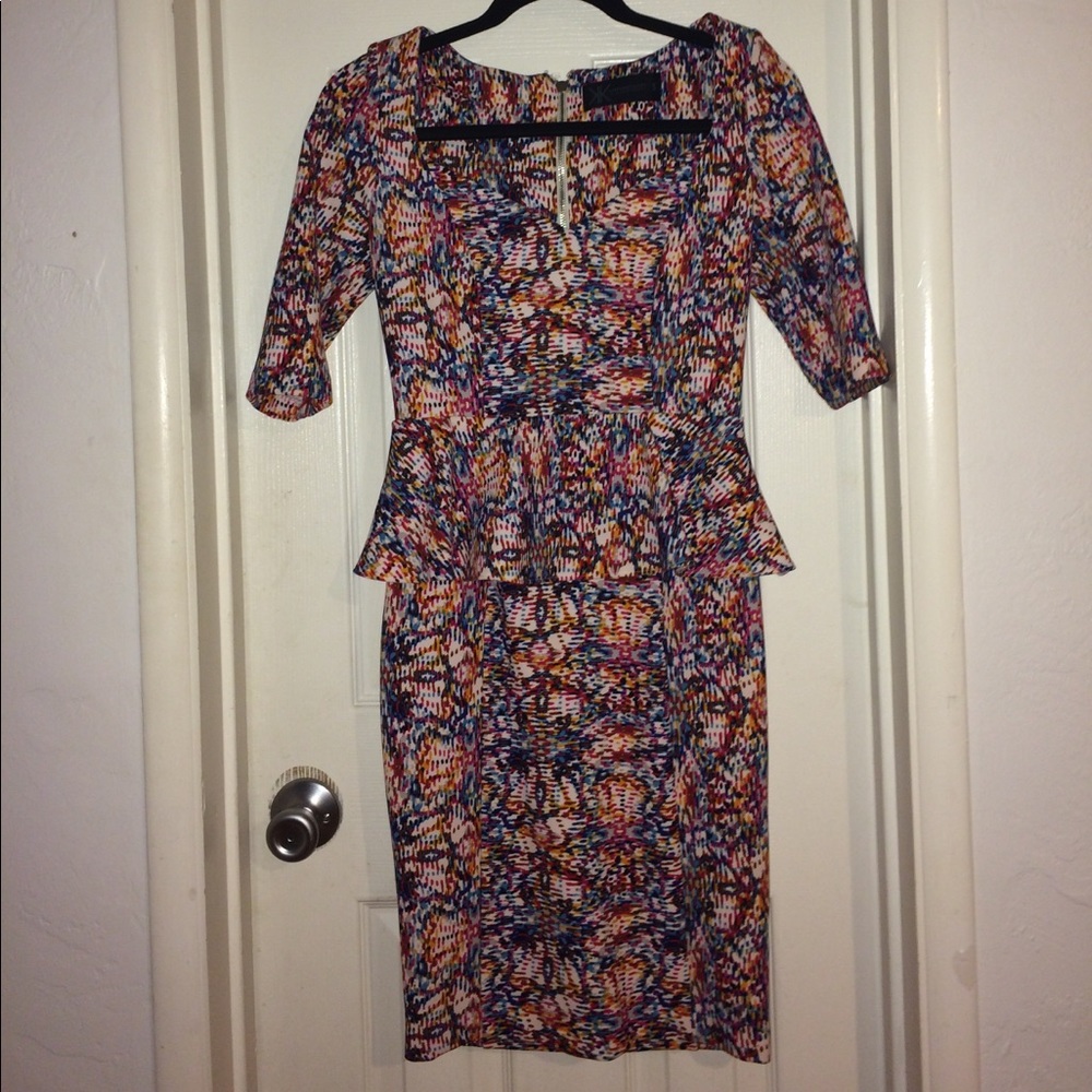 Festive peplum dress! Can fit a size 4-6