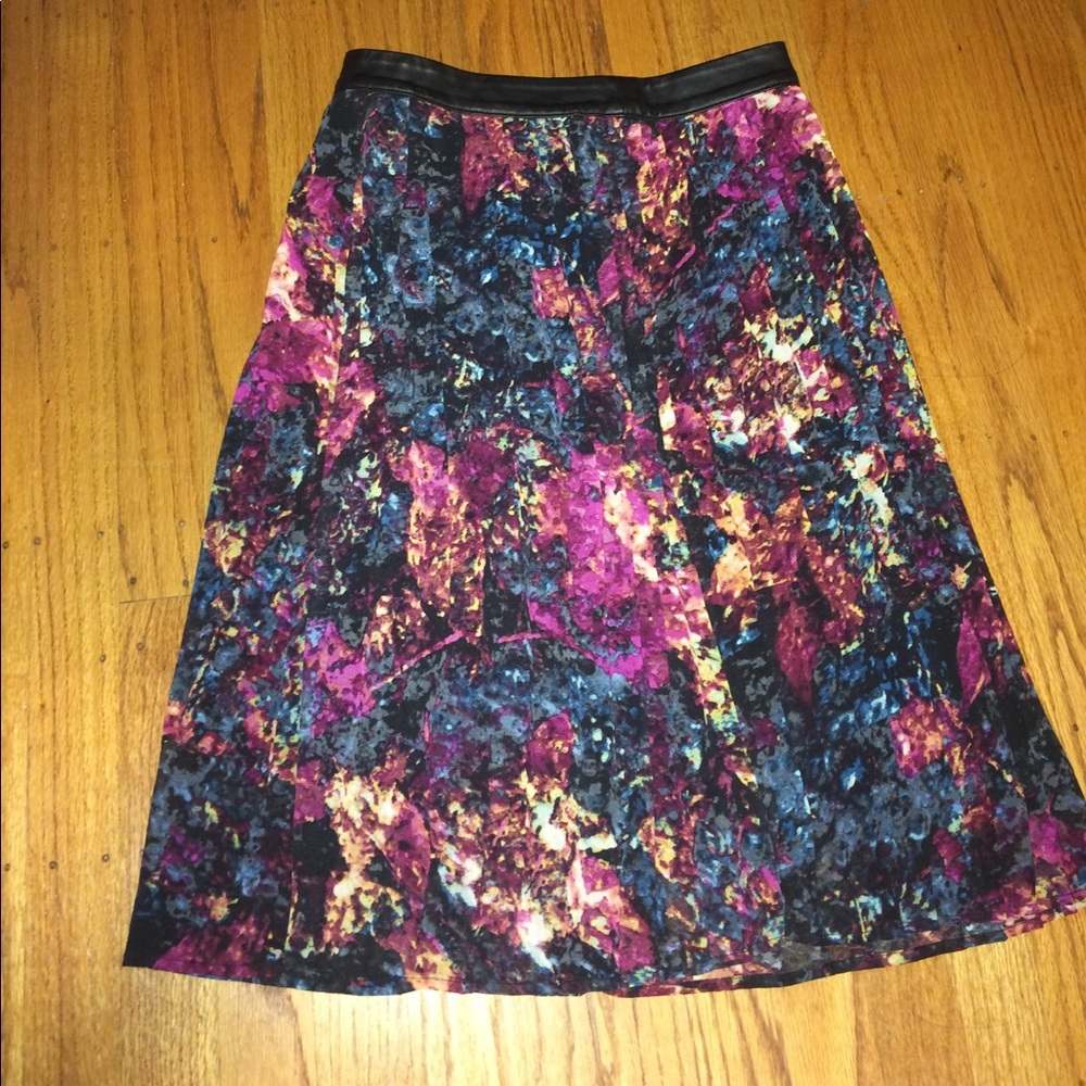 High waisted and Long pleated skirt.