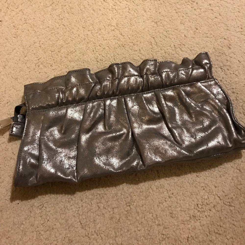 Beautiful metallic silver clutch by Express.