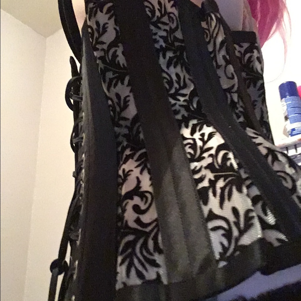 Women's lace up black and silver corset