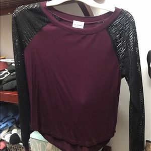Maroon shirt with mesh sleeves