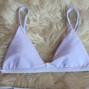 Adorable white two piece swim suit.