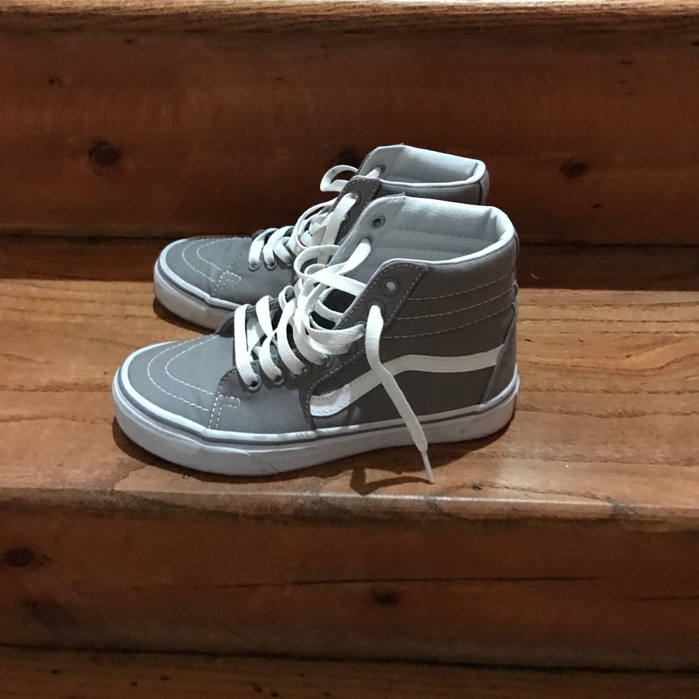 Gray and white high top vans