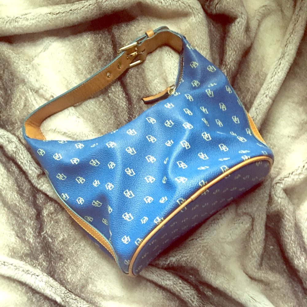 VINTAGE DOONEY AND BOURKE BUCKET BACK
