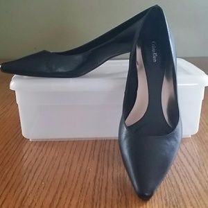Black low heeled pumps