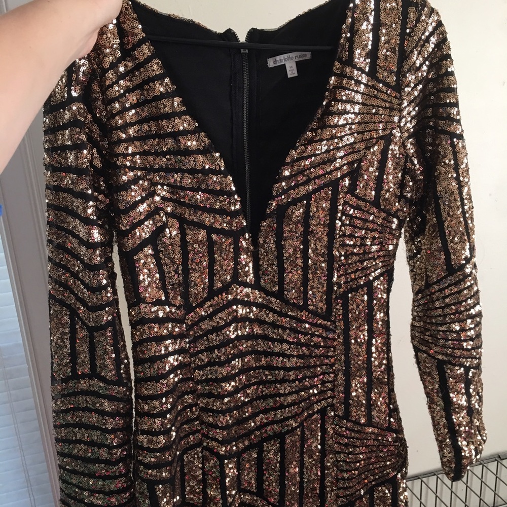 Gold and black sequin v cut dress