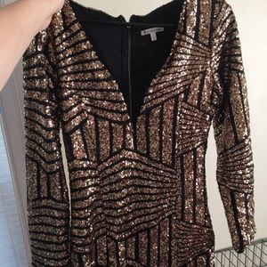 Gold and black sequin v cut dress
