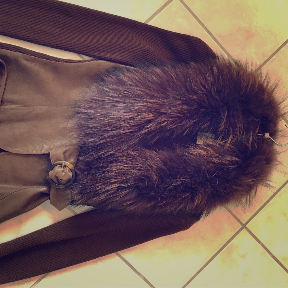 Leather and raccoon fur copper pants suit.