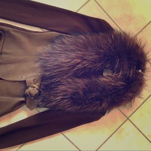 Leather and raccoon fur copper pants suit.