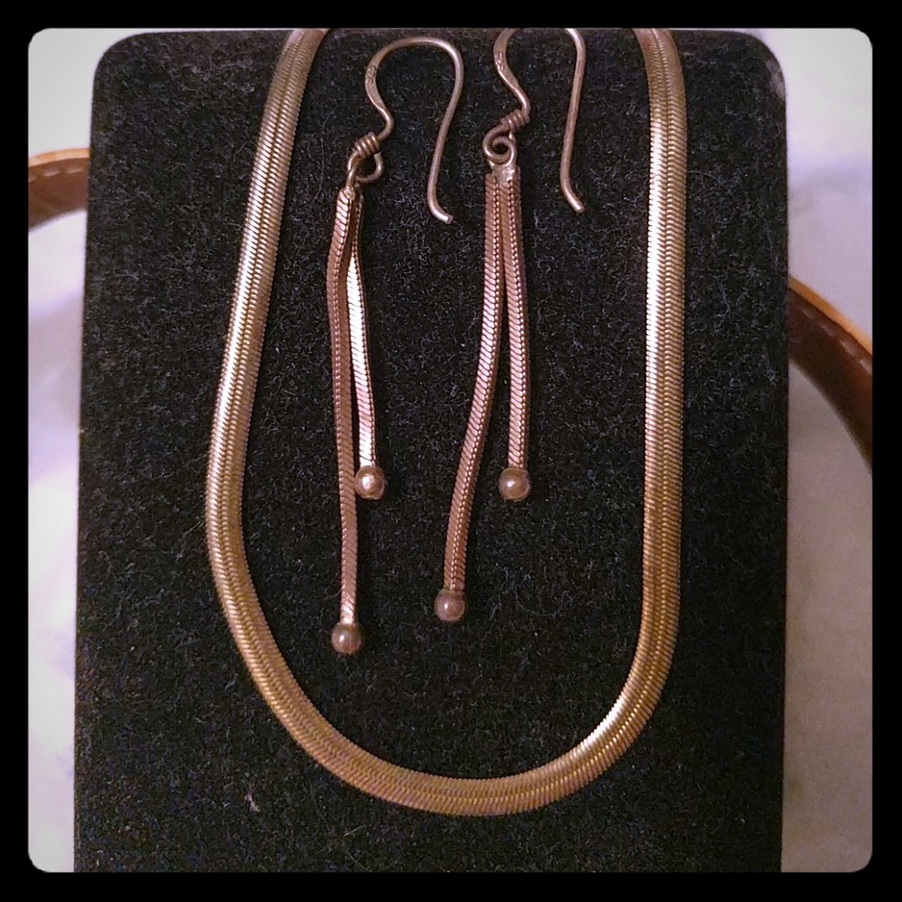 Silver necklace and earring set