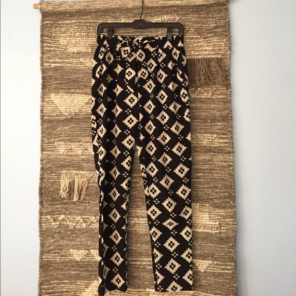 Cream and black printed pants.