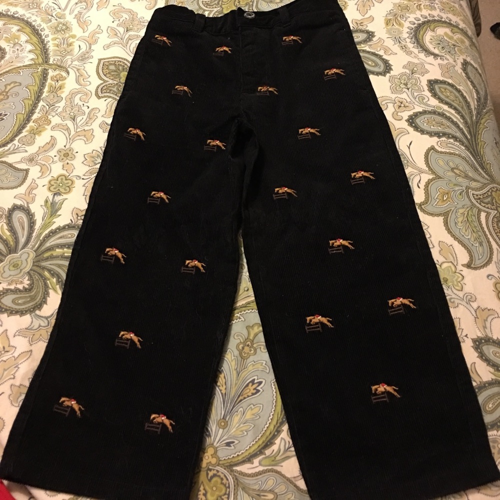 Corduroy pants with embroidery .