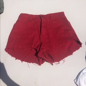 Red cutoff shorts