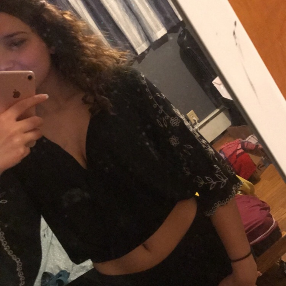 Black v neck with white flowers