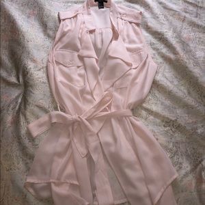 Light pink sleeveless blouse