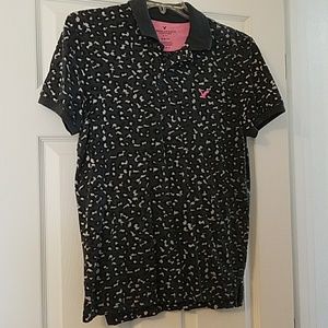 Navy with Gray small print and pink accents polo