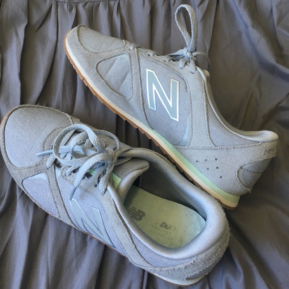 Grey and light blue New Balance's