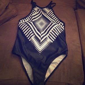 Size medium junior one piece