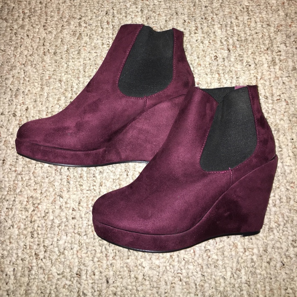 Maroon suede wedge booties.