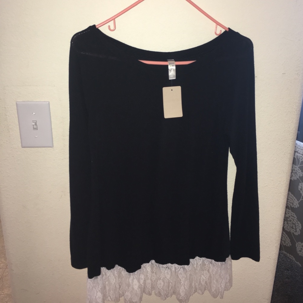 Cute lace bottom top.