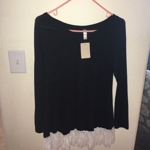 Cute lace bottom top.