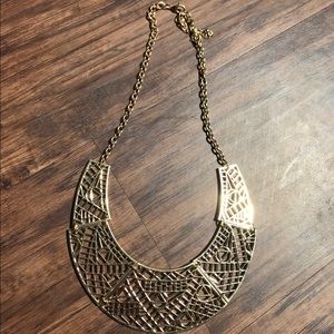 Gold colored necklace