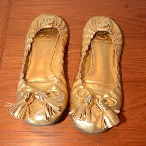 Gold Tory Burch flats with tassels size 5.5