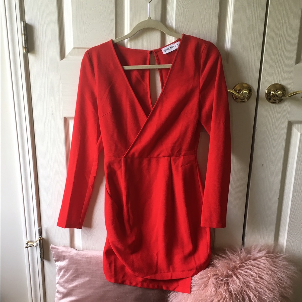Tight red v-neck dress