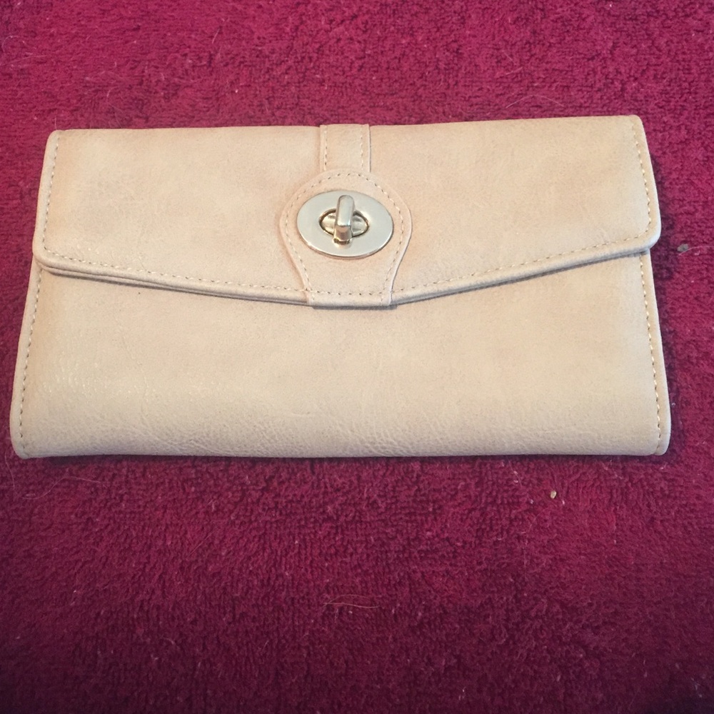 Tan suede like wallet from Charming Charlie.