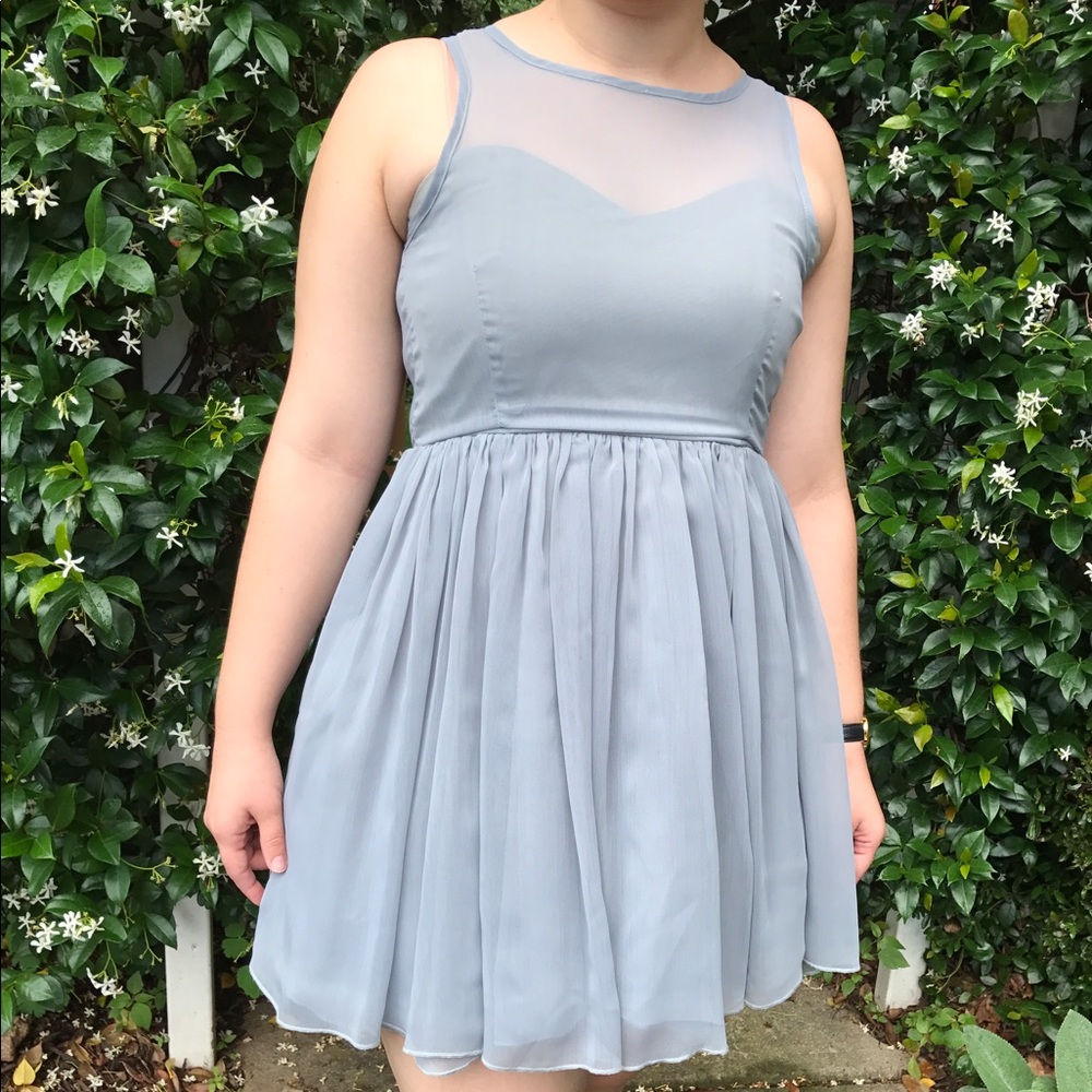 Mini dress with sheer overlay on top