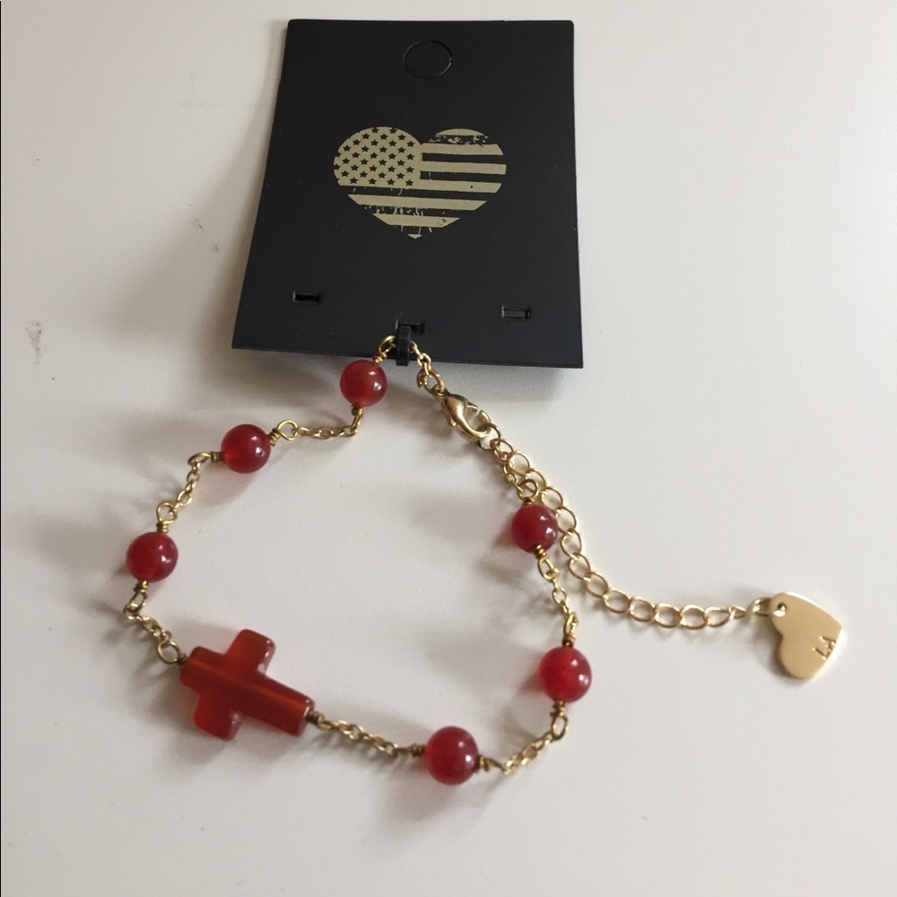 Glass red cross bracelet by Brandy Melville