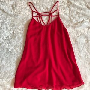 Edgy cage design top with open back size M