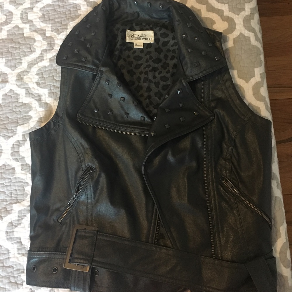 Grey sleeveless jacket