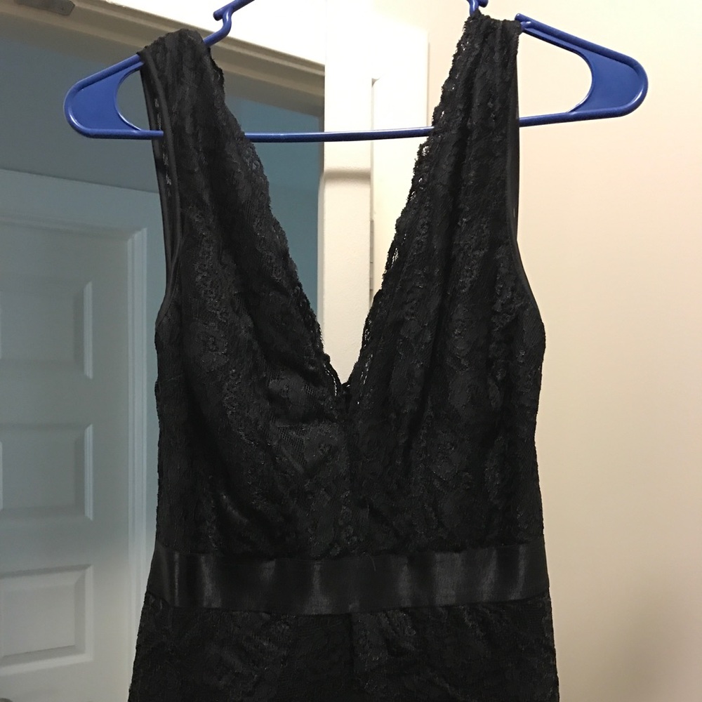 Bebe Lace Detail Jumpsuit in black! Sz XS.