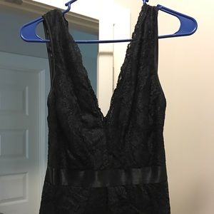 Bebe Lace Detail Jumpsuit in black! Sz XS.