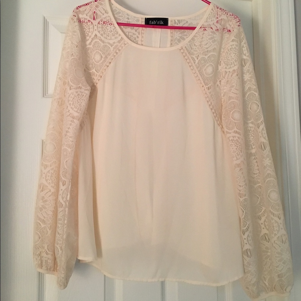 Cream top from Fabrik. Lace sleeves and open back
