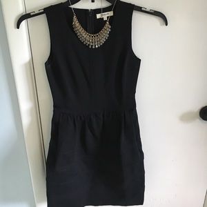 Black cocktail dress from Madewell.