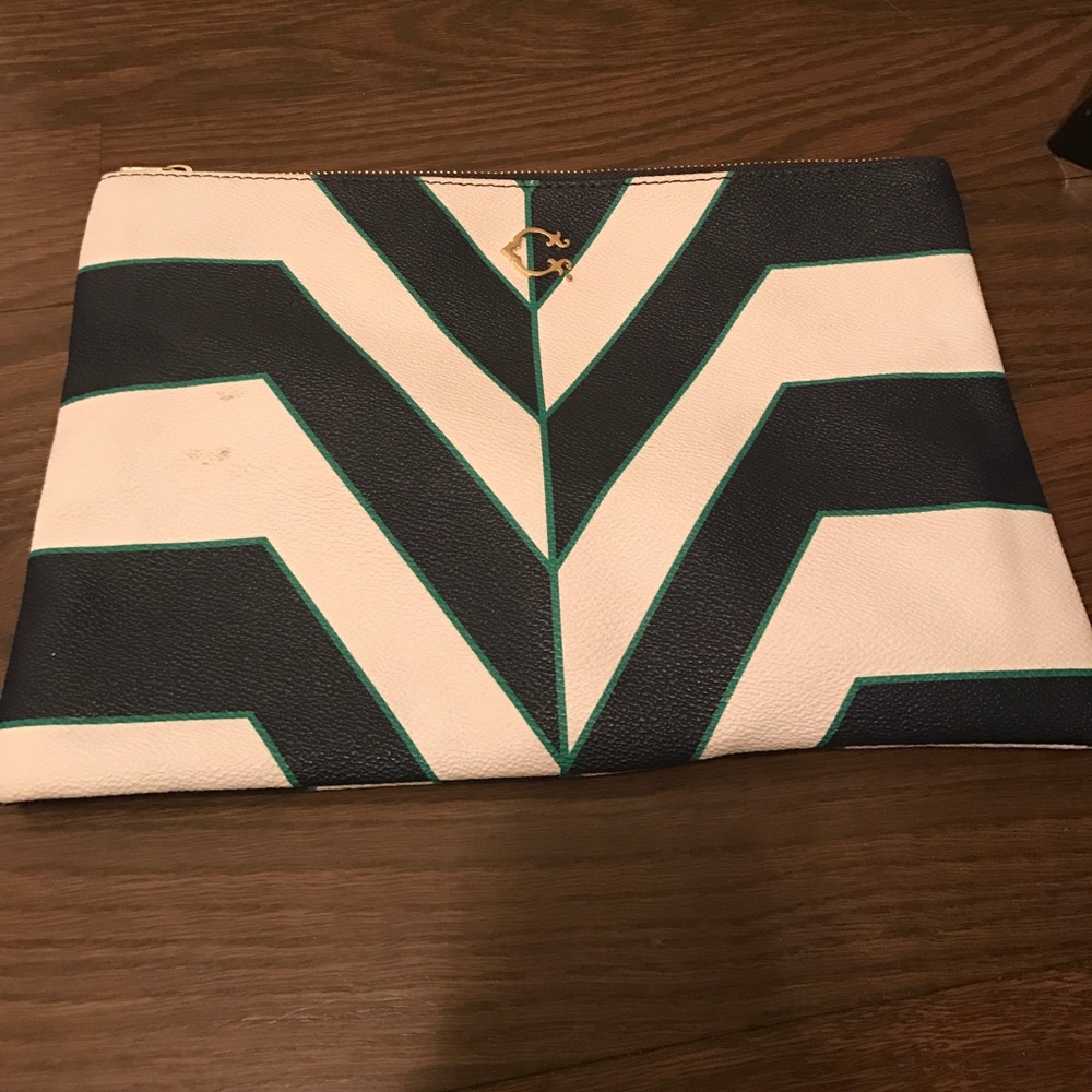 C. Wonder Striped Clutch