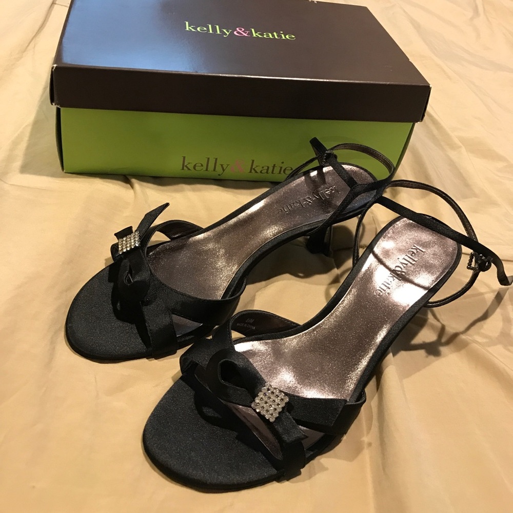 Black dress shoes on low heels