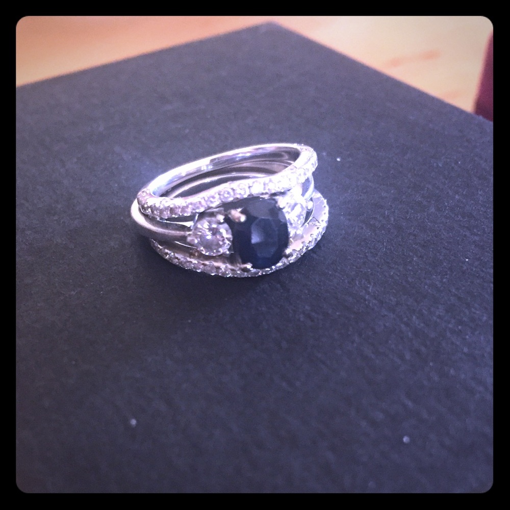 Sapphire and diamond ring with diamond bands
