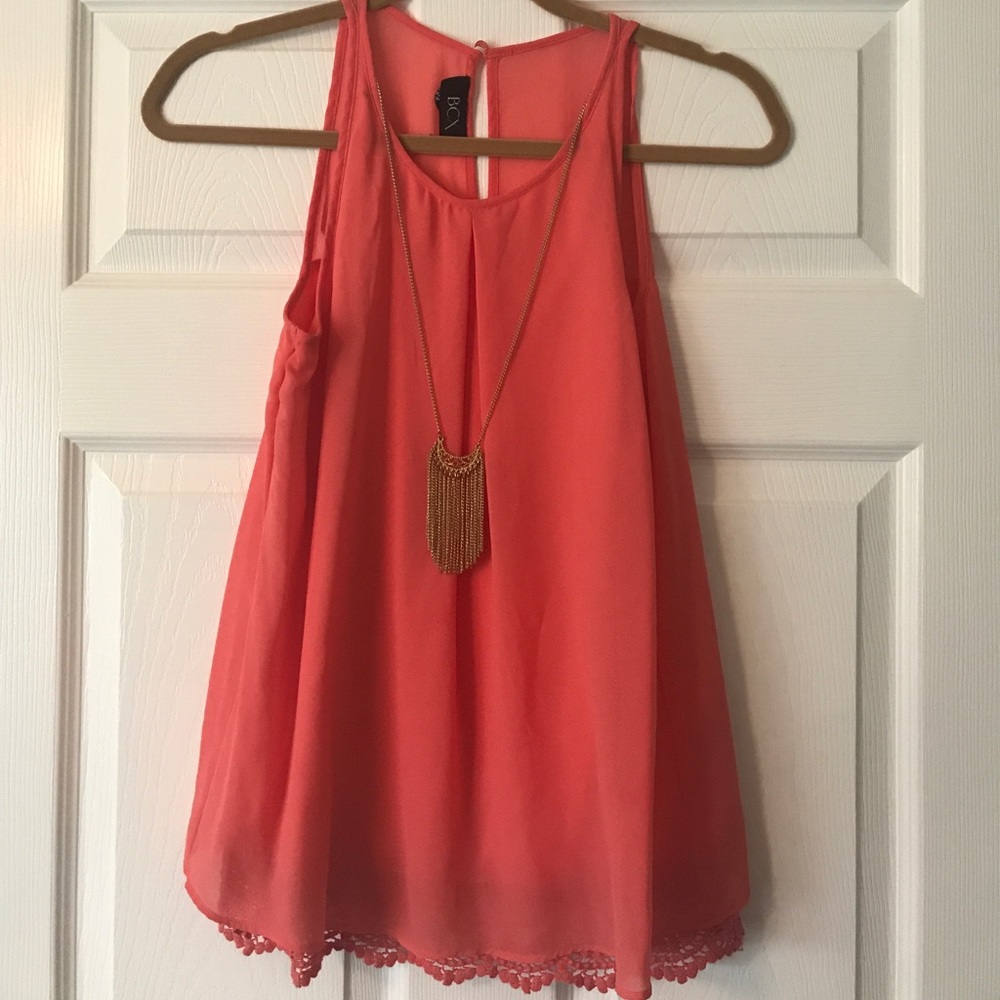 Coral top with gold jewellery necklace