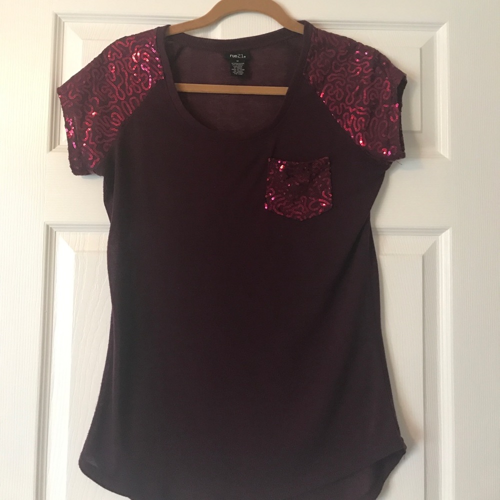 Burgandy top with sequin detail.