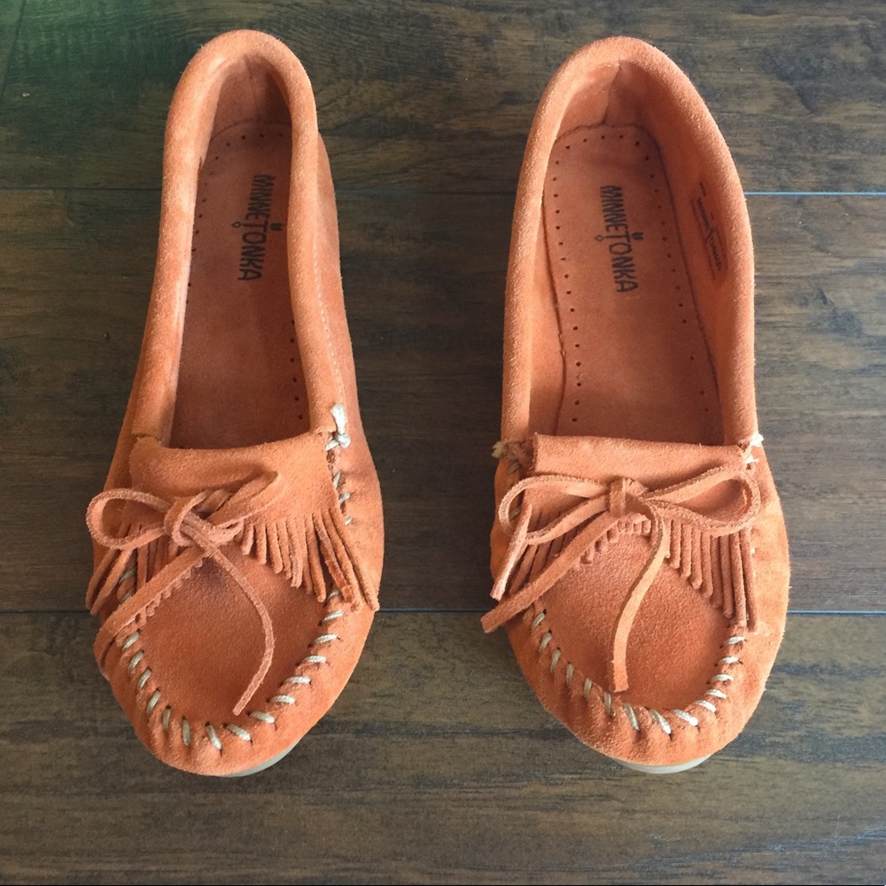 Minnetonka Moccasins- NWOT Burnt Orange size: 10
