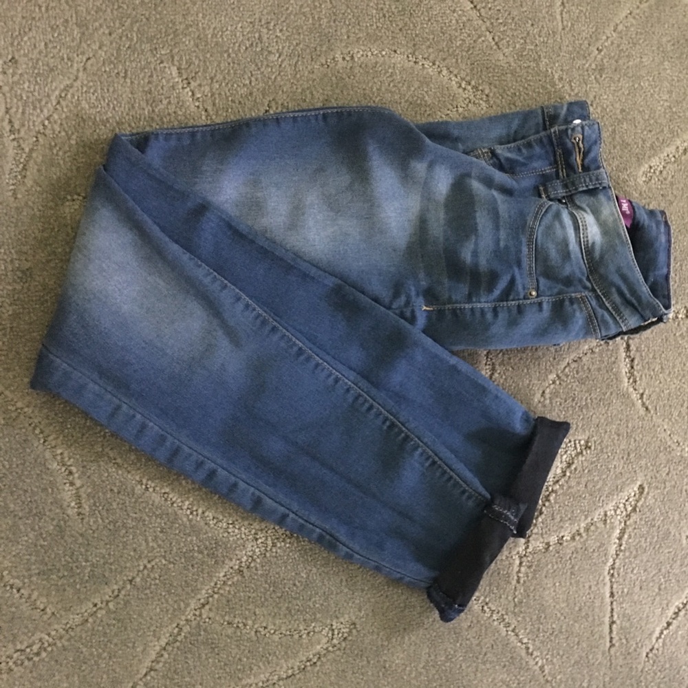 Blue rolled up jeans