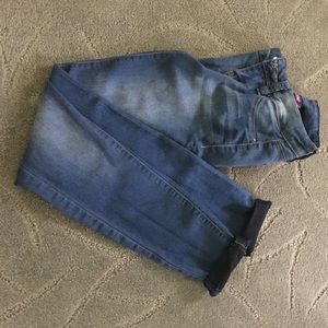 Blue rolled up jeans