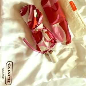 NWOT Coach red, pinks and purple umbrella
