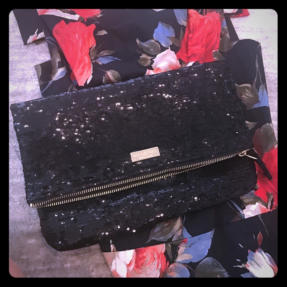 Halston Heritage black sequence foldover clutch.