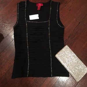 Sleeveless black knit top w/ rhinestone trim